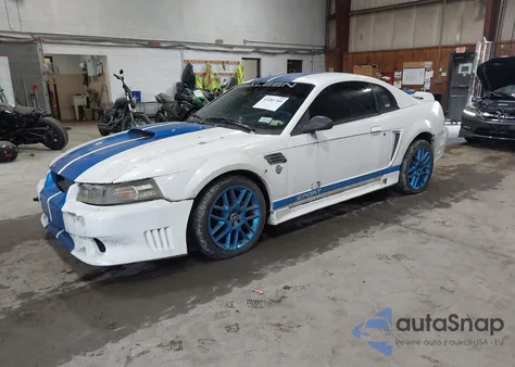 1999 Ford Mustang z USA, uszkodzony, nr VIN 1FAFP4043XF147281